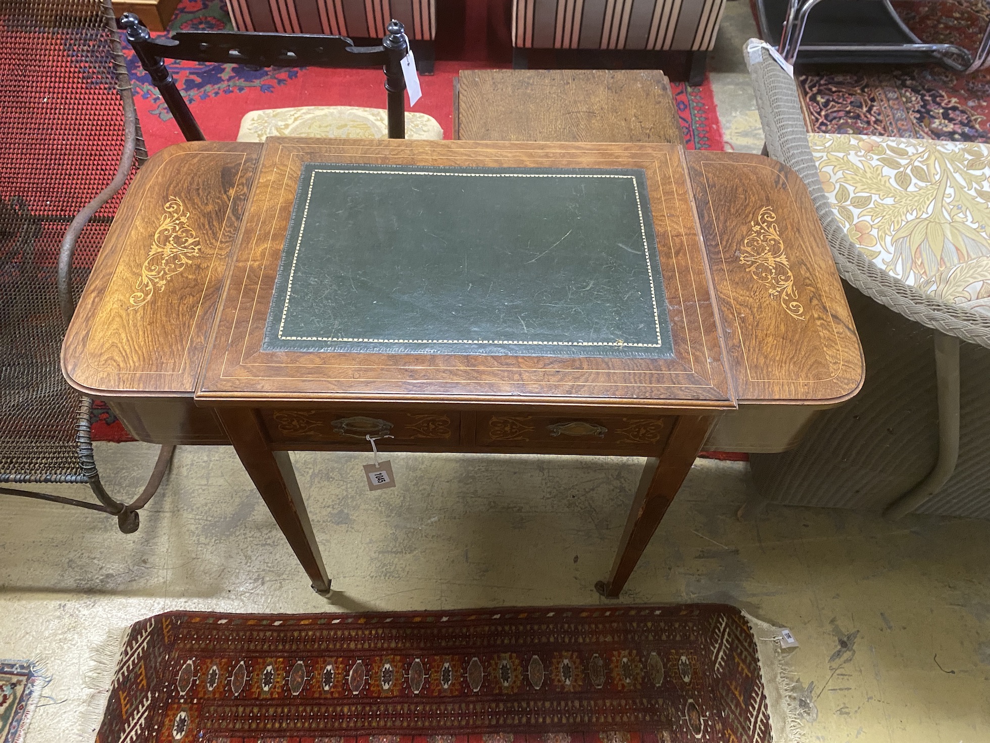 A late Victorian inlaid rosewood writing table, width 94cm, depth 45cm, height 72cm